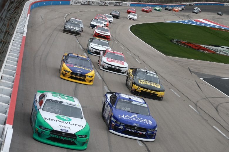 FORT WORTH, TX - MARCH 30: Austin Cindric, driver of the #22 MoneyLion Ford, leads a pack of cars during the NASCAR Xfinity Series My Bariatric Solutions 300 at Texas Motor Speedway on March 30, 2019 in Fort Worth, Texas. (Photo by Matt Sullivan/Getty Images) | Getty Images