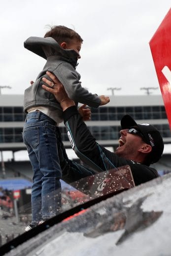 FORT WORTH, TX - MARCH 30: Kyle Busch, driver of the #18 iK9 Toyota, celebrates with his son Brexton in Victory Lane after winning the NASCAR Xfinity Series My Bariatric Solutions 300 at Texas Motor Speedway on March 30, 2019 in Fort Worth, Texas. (Photo by Chris Graythen/Getty Images) | Getty Images