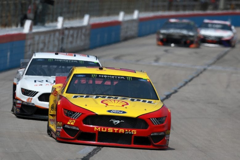 FORT WORTH, TX - MARCH 31: Joey Logano, driver of the #22 Shell Pennzoil Ford, leads a pack of cars during the Monster Energy NASCAR Cup Series O'Reilly Auto Parts 500 at Texas Motor Speedway on March 31, 2019 in Fort Worth, Texas. (Photo by Sean Gardner/Getty Images) | Getty Images