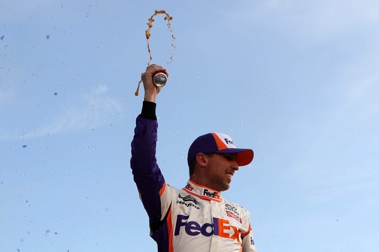 FORT WORTH, TX - MARCH 31: Denny Hamlin, driver of the #11 FedEx Office Toyota, celebrates in victory lane after winning the Monster Energy NASCAR Cup Series O'Reilly Auto Parts 500 at Texas Motor Speedway on March 31, 2019 in Fort Worth, Texas. (Photo by Chris Graythen/Getty Images) | Getty Images
