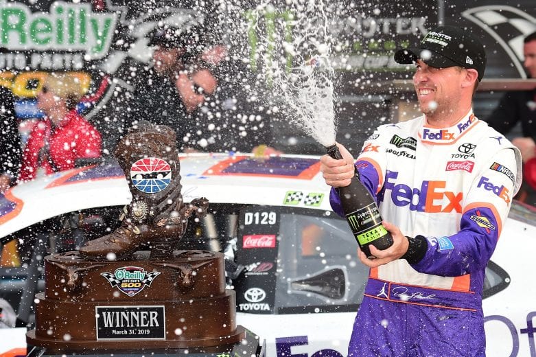 FORT WORTH, TX - MARCH 31: Denny Hamlin, driver of the #11 FedEx Office Toyota, celebrates in Victory Lane after winning the Monster Energy NASCAR Cup Series O'Reilly Auto Parts 500 at Texas Motor Speedway on March 31, 2019 in Fort Worth, Texas. (Photo by Jared C. Tilton/Getty Images) | Getty Images