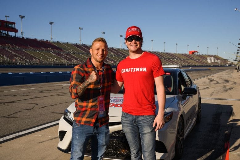 FONTANA, CA - MARCH 17: T.J. Dillashaw and Erik Jones attend the Monster Energy NASCAR Cup Series race at Auto Club Speedway at Auto Club Speedway on March 17, 2019 in Fontana, California. (Photo by Presley Ann/Getty Images) | Getty Images