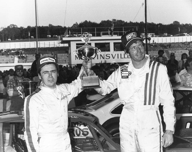 MARTINSVILLE, VA — October 29, 1978:  Geoff Bodine (L) and Sam Ard (R) celebrate in victory lane at Martinsville Speedway following the Cardinal 500 Classic.  Bodine took the win in the NASCAR Modified Tour segment while Ard took the checkered first in the NASCAR Late Model Sportsman half.  (Photo by ISC Images & Archives via Getty Images)