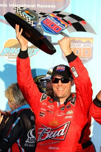 AVONDALE, AZ - NOVEMBER 11:  Kevin Harvick, driver of the #29 Budweiser Chevrolet, celebrates in Victory Lane after winning the NASCAR Sprint Cup Series AdvoCare 500 at Phoenix International Raceway on November 11, 2012 in Avondale, Arizona.  (Photo by Tyler Barrick/Getty Images) | Getty Images