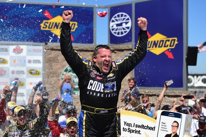 SONOMA, CA - JUNE 26:  Tony Stewart, driver of the #14 Code 3 Assoc/Mobil 1 Chevrolet, celebrates in victory lane after winning the NASCAR Sprint Cup Series Toyota/Save Mart 350 at Sonoma Raceway on June 26, 2016 in Sonoma, California.  (Photo by Jared C. Tilton/Getty Images) | Getty Images