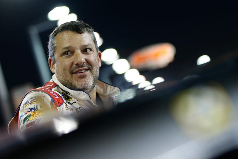 HOMESTEAD, FL - NOVEMBER 18:  Tony Stewart, driver of the #14 Always a Racer/Mobil 1 Chevrolet, stands on the grid during qualifying for the NASCAR Sprint Cup Series Ford EcoBoost 400 at Homestead-Miami Speedway on November 18, 2016 in Homestead, Florida.  (Photo by Brian Lawdermilk/Getty Images) | Getty Images