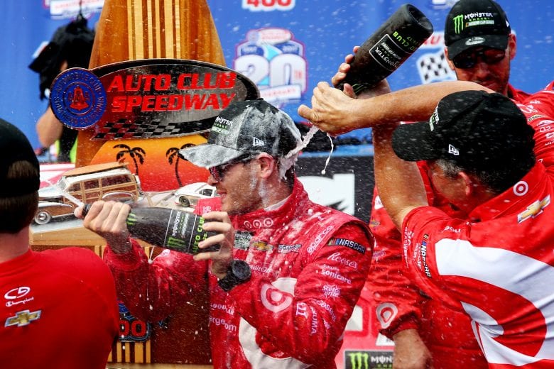 FONTANA, CA - MARCH 26: Kyle Larson, driver of the #42 Target Chevrolet, celebrates in victory lane after winning the Monster Energy NASCAR Cup Series Auto Club 400 at Auto Club Speedway on March 26, 2017 in Fontana, California. (Photo by Sarah Crabill/Getty Images) | Getty Images