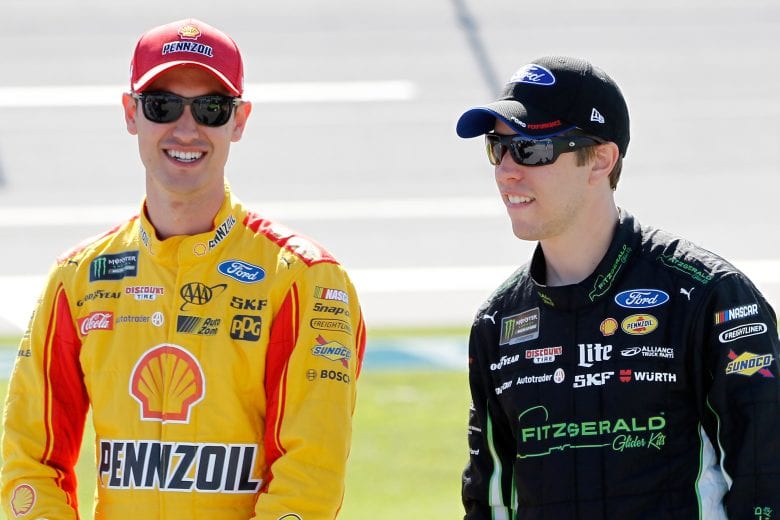 TALLADEGA, AL - MAY 06:  Joey Logano, driver of the #22 Shell Pennzoil Ford, talks to Brad Keselowski, driver of the #2 Fitzgerald Glider Kits Ford, on the grid during qualifying for the Monster Energy NASCAR Cup Series GEICO 500 at Talladega Superspeedway on May 6, 2017 in Talladega, Alabama.  (Photo by Brian Lawdermilk/Getty Images) | Getty Images