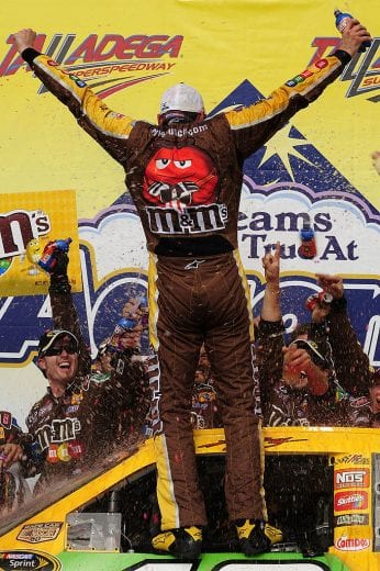 TALLADEGA, AL - APRIL 27: Kyle Busch, driver of the #18 M&M's Toyota, celebrates in victory lane after winning the NASCAR Sprint Cup Series Aaron's 499 at Talladega Superspeedway on April 27, 2008 in Talladega, Alabama. (Photo by Rusty Jarrett/Getty Images for NASCAR) | Getty Images