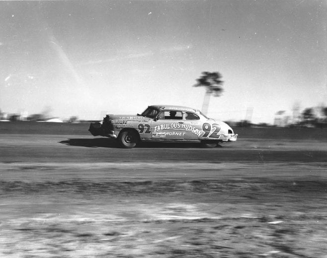WEST PALM BEACH, FL - NOVEMBER 30, 1952:  Herb Thomas drives his Smokey Yunick-prepared Hudson to victory at Palm Beach (FL) Speedway.  (Photo by ISC Archives via Getty Images)