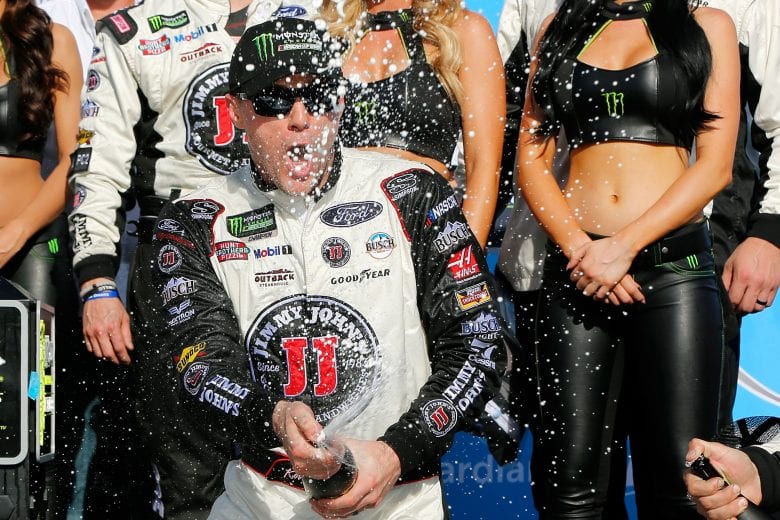 AVONDALE, AZ - MARCH 11: Kevin Harvick, driver of the #4 Jimmy John's Ford, celbrates with champagne in Victory Lane after winning the Monster Energy NASCAR Cup Series TicketGuardian 500 at ISM Raceway on March 11, 2018 in Avondale, Arizona. (Photo by Jonathan Ferrey/Getty Images) | Getty Images