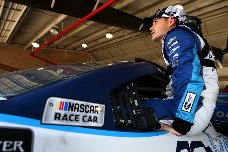 FONTANA, CA - MARCH 17: Kyle Larson, driver of the #42 DC Solar Chevrolet, climbs into his car during practice for the Monster Energy NASCAR Cup Series Auto Club 400 at Auto Club Speedway on March 17, 2018 in Fontana, California. (Photo by Sarah Crabill/Getty Images) | Getty Images