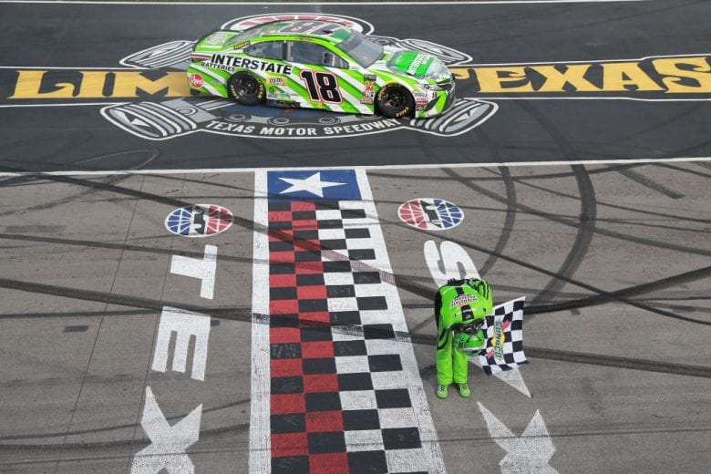 FORT WORTH, TX - APRIL 08: Kyle Busch, driver of the #18 Interstate Batteries Toyota, celebrates winning the Monster Energy NASCAR Cup Series O'Reilly Auto Parts 500 at Texas Motor Speedway on April 8, 2018 in Fort Worth, Texas. (Photo by Sean Gardner/Getty Images) | Getty Images