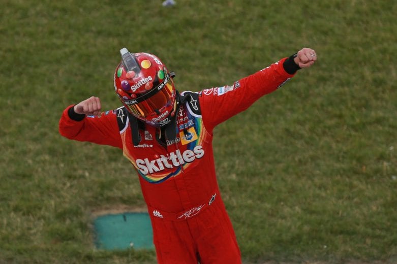 JOLIET, IL - JULY 01: Kyle Busch, driver of the #18 Skittles Red White & Blue Toyota, celebrates after winning the Monster Energy NASCAR Cup Series Overton's 400 at Chicagoland Speedway on July 1, 2018 in Joliet, Illinois. (Photo by Matt Sullivan/Getty Images) | Getty Images