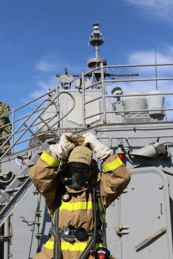 Denny Hamlin goes through training on the USS San Jacinto at Naval Station Norfolk in Virginia.