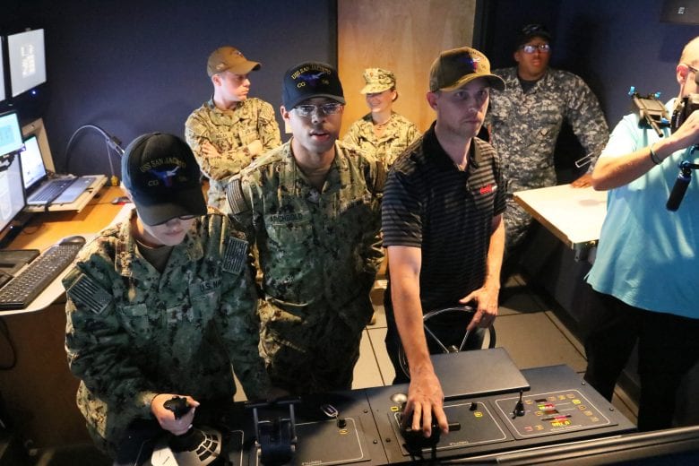 Denny Hamlin goes through training on the USS San Jacinto at Naval Station Norfolk in Virginia.