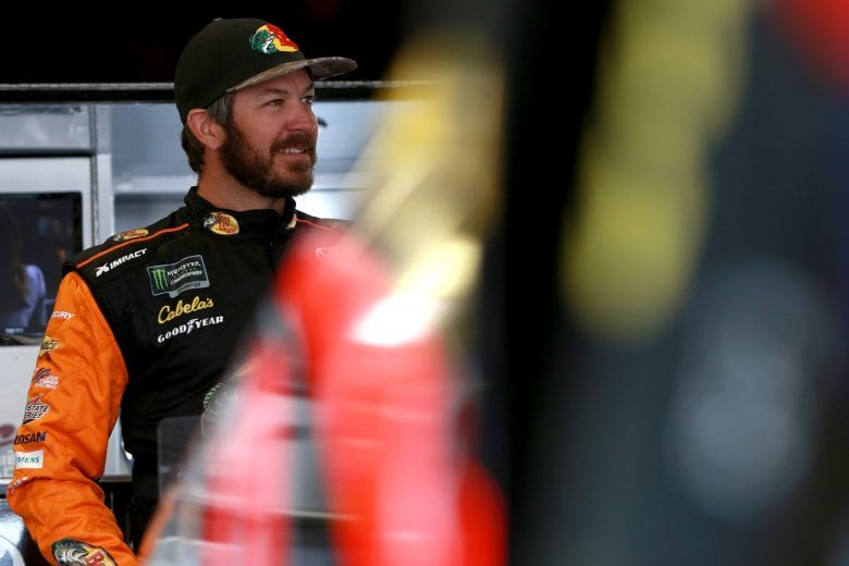 FORT WORTH, TX - MARCH 29: Martin Truex Jr., driver of the #19 Bass Pro Shops Toyota, stands in the garage during practice for the Monster Energy NASCAR Cup Series O'Reilly Auto Parts 500 at Texas Motor Speedway on March 29, 2019 in Fort Worth, Texas. (Photo by Sean Gardner/Getty Images) | Getty Images