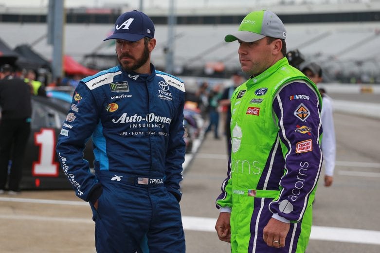 RICHMOND, VA - APRIL 12: Martin Truex Jr, driver of the #19 Auto Owners Insurance Toyota, talks with Ryan Newman, driver of the #6 Roush Performance Ford, walks to his car during qualifying for the Monster Energy NASCAR Cup Series Toyota Owners 400 at Richmond Raceway on April 12, 2019 in Richmond, Virginia. (Photo by Matt Sullivan/Getty Images) | Getty Images