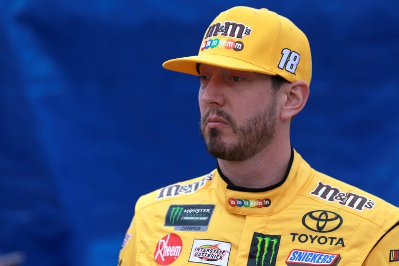 RICHMOND, VA - APRIL 12: Kyle Busch, driver of the #18 M&M's Toyota, stands next to his car during qualifying for the Monster Energy NASCAR Cup Series Toyota Owners 400 at Richmond Raceway on April 12, 2019 in Richmond, Virginia. (Photo by Sean Gardner/Getty Images) | Getty Images