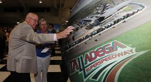 Talladega chairman Grant Lynch points out amenities for the Talladega Superspeedway transformation project.