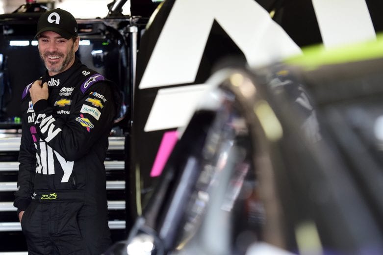 FORT WORTH, TX - MARCH 30: Jimmie Johnson, driver of the #48 Ally Chevrolet, stands in the garage area during practice for the Monster Energy NASCAR Cup Series O'Reilly Auto Parts 500 at Texas Motor Speedway on March 30, 2019 in Fort Worth, Texas. (Photo by Jared C. Tilton/Getty Images) | Getty Images