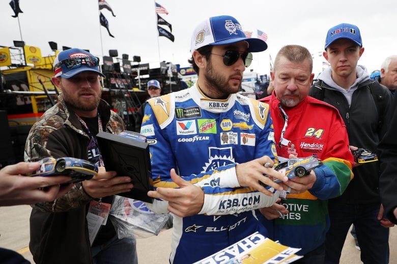 FORT WORTH, TX - MARCH 30: Chase Elliott, driver of the #9 Kelley Blue Book Chevrolet, signs autographs during practice for the Monster Energy NASCAR Cup Series O'Reilly Auto Parts 500 at Texas Motor Speedway on March 30, 2019 in Fort Worth, Texas. (Photo by Chris Graythen/Getty Images) | Getty Images