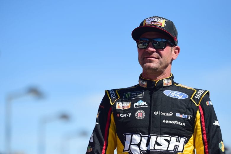 FONTANA, CA - MARCH 15: Clint Bowyer, driver of the #14 Rush Truck Centers/Haas Automation Ford, walks on the grid during qualifying for the Monster Energy NASCAR Cup Series Auto Club 400 at Auto Club Speedway on March 15, 2019 in Fontana, California. (Photo by Jared C. Tilton/Getty Images) | Getty Images