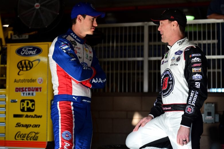 FONTANA, CA - MARCH 16:  Joey Logano, driver of the #22 AAA Southern California Ford, talks with Kevin Harvick, driver of the #4 Jimmy John's Ford, during practice for the Monster Energy NASCAR Cup Series Auto Club 400 at Auto Club Speedway on March 16, 2019 in Fontana, California.  (Photo by Jared C. Tilton/Getty Images) | Getty Images