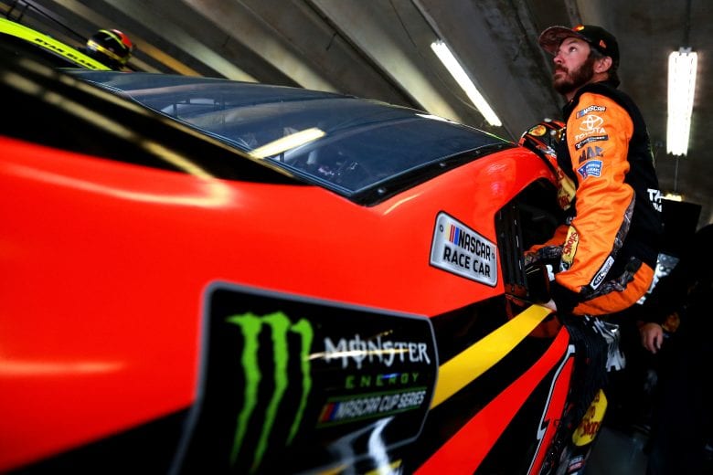 FORT WORTH, TX - MARCH 29: Martin Truex Jr., driver of the #19 Bass Pro Shops Toyota, gets into his car in the garage during practice for the Monster Energy NASCAR Cup Series O'Reilly Auto Parts 500 at Texas Motor Speedway on March 29, 2019 in Fort Worth, Texas. (Photo by Sean Gardner/Getty Images) | Getty Images