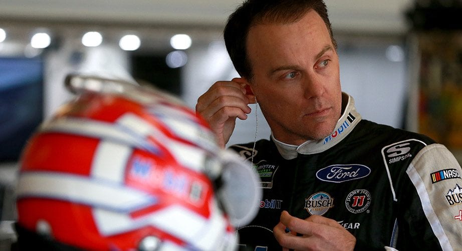 Kevin Harvick looks on in the garage at Texas.