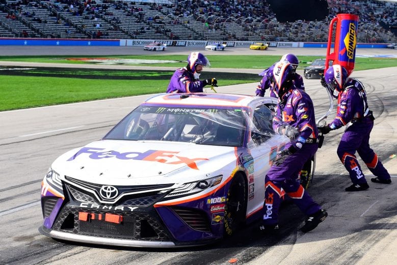 Denny Hamlin makes a pit stop at Texas.