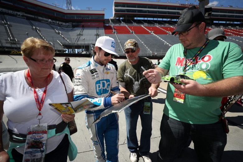 BRISTOL, TN - APRIL 05: Ryan Blaney, driver of the #12 PPG Ford, signs autographs during practice for the Monster Energy NASCAR Cup Series Food City 500 at Bristol Motor Speedway on April 5, 2019 in Bristol, Tennessee. (Photo by Chris Graythen/Getty Images) | Getty Images