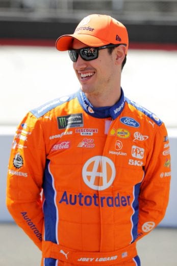 BRISTOL, TN - APRIL 05: Joey Logano, driver of the #22 Autotrader Ford, stands on the grid during practice for the Monster Energy NASCAR Cup Series Food City 500 at Bristol Motor Speedway on April 5, 2019 in Bristol, Tennessee. (Photo by Donald Page/Getty Images) | Getty Images
