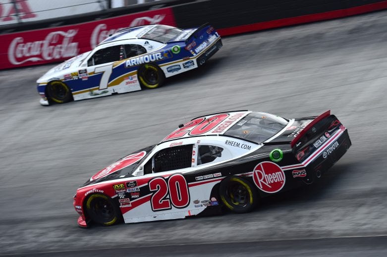 BRISTOL, TN - APRIL 06: Christopher Bell, driver of the #20 Rheem Toyota, races Justin Allgaier, driver of the #7 ARMOUR Vienna Sausage Chevrolet, during the NASCAR Xfinity Series Alsco 300 at Bristol Motor Speedway on April 6, 2019 in Bristol, Tennessee. (Photo by Jared C. Tilton/Getty Images) | Getty Images