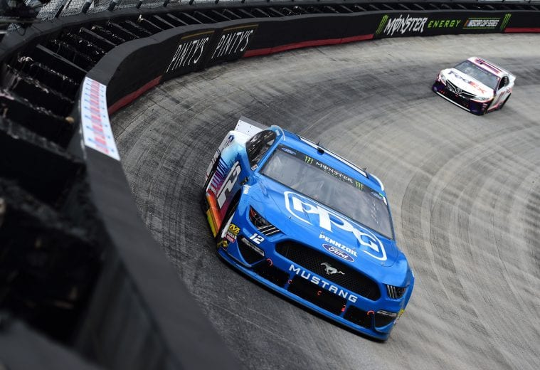 Ryan Blaney leads Denny Hamlin at Bristol.