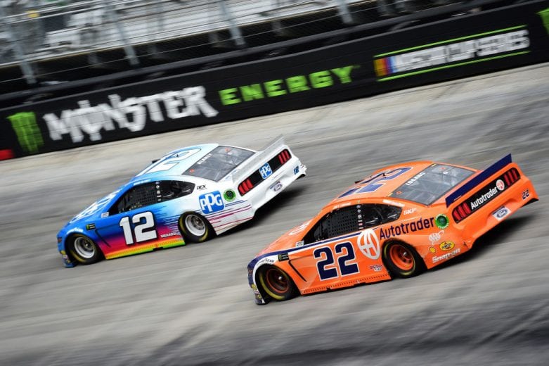 BRISTOL, TN - APRIL 07: Ryan Blaney, driver of the #12 PPG Ford, races Joey Logano, driver of the #22 Autotrader Ford, during the Monster Energy NASCAR Cup Series Food City 500 at Bristol Motor Speedway on April 7, 2019 in Bristol, Tennessee. (Photo by Jared C. Tilton/Getty Images) | Getty Images