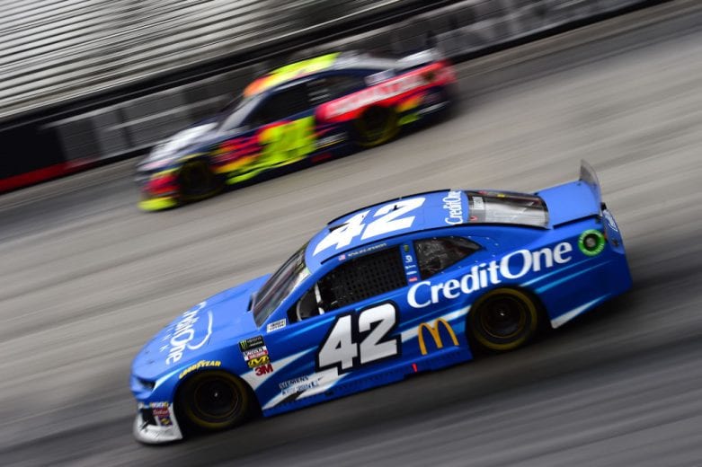 BRISTOL, TN - APRIL 07: Kyle Larson, driver of the #42 Credit One Bank Chevrolet, races William Byron, driver of the #24 Axalta Chevrolet, during the Monster Energy NASCAR Cup Series Food City 500 at Bristol Motor Speedway on April 7, 2019 in Bristol, Tennessee. (Photo by Jared C. Tilton/Getty Images) | Getty Images