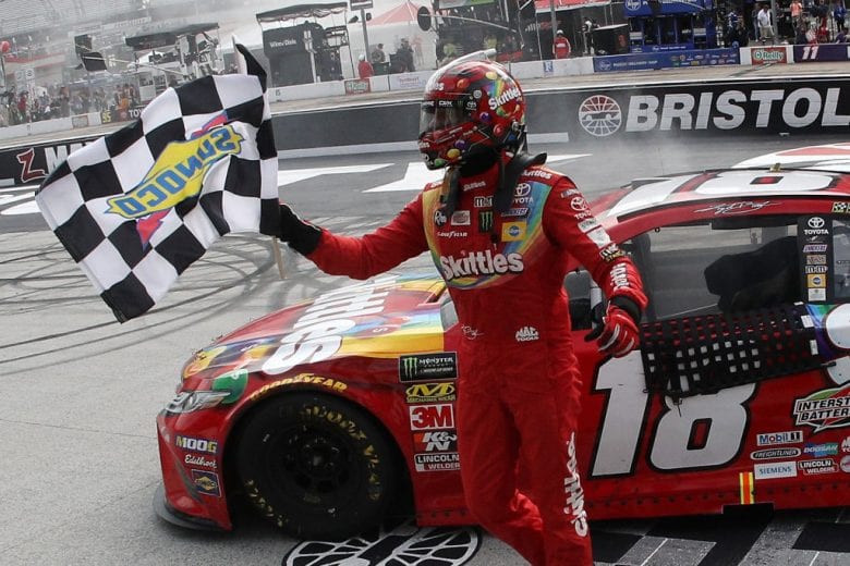 BRISTOL, TN - APRIL 07: Kyle Busch, driver of the #18 Skittles Toyota, celebrates after winning the Monster Energy NASCAR Cup Series Food City 500 at Bristol Motor Speedway on April 7, 2019 in Bristol, Tennessee. (Photo by Chris Graythen/Getty Images) | Getty Images