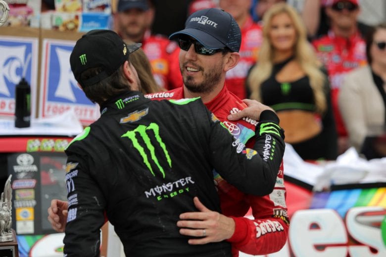 BRISTOL, TN - APRIL 07: Kurt Busch, driver of the #1 Monster Energy Chevrolet, congratulates Kyle Busch, driver of the #18 Skittles Toyota, in Victory Lane after winning the Monster Energy NASCAR Cup Series Food City 500 at Bristol Motor Speedway on April 7, 2019 in Bristol, Tennessee. (Photo by Donald Page/Getty Images) | Getty Images