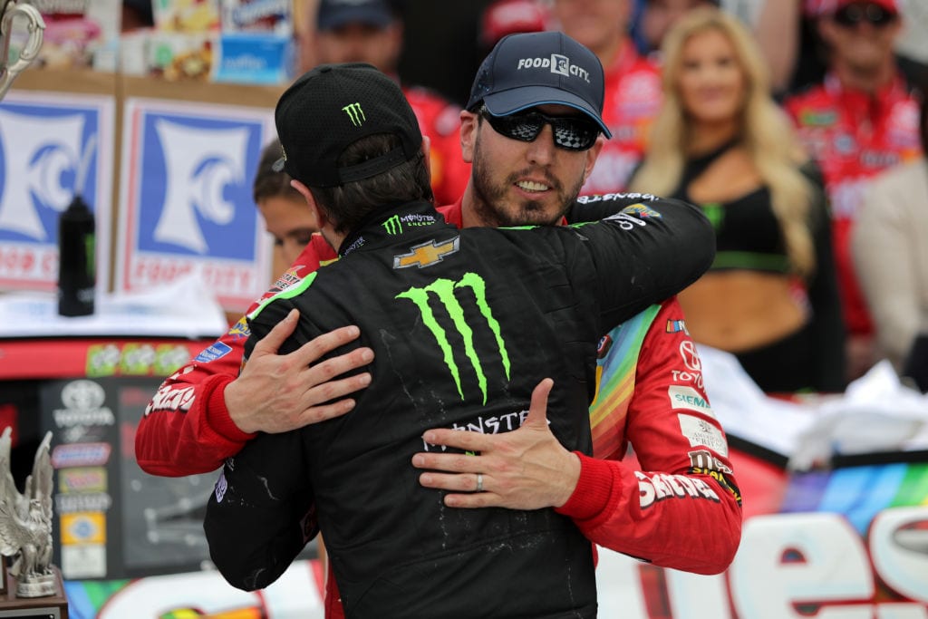BRISTOL, TN - APRIL 07:  Kurt Busch, driver of the #1 Monster Energy Chevrolet, congratulates Kyle Busch, driver of the #18 Skittles Toyota, in Victory Lane after winning the Monster Energy NASCAR Cup Series Food City 500 at Bristol Motor Speedway on April 7, 2019 in Bristol, Tennessee.  (Photo by Donald Page/Getty Images) | Getty Images