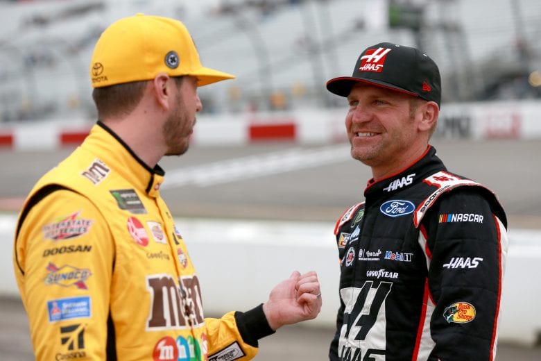 RICHMOND, VA - APRIL 12:  Kyle Busch, driver of the #18 M&M's Toyota, and Clint Bowyer, driver of the #14 Haas Automation Ford, stand on pit road during qualifying for the Monster Energy NASCAR Cup Series Toyota Owners 400 at Richmond Raceway on April 12, 2019 in Richmond, Virginia.  (Photo by Sean Gardner/Getty Images) | Getty Images