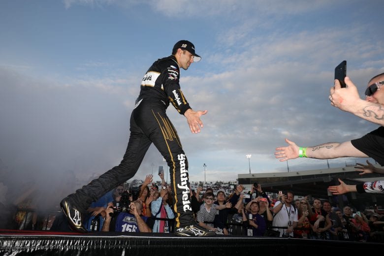 RICHMOND, VA - APRIL 13:  Aric Almirola, driver of the #10 Smithfield Get Grilling Ford, is introduced during pre-race ceremonies prior to the start of the Monster Energy NASCAR Cup Series Toyota Owners 400 at Richmond Raceway on April 13, 2019 in Richmond, Virginia.  (Photo by Donald Page/Getty Images) | Getty Images