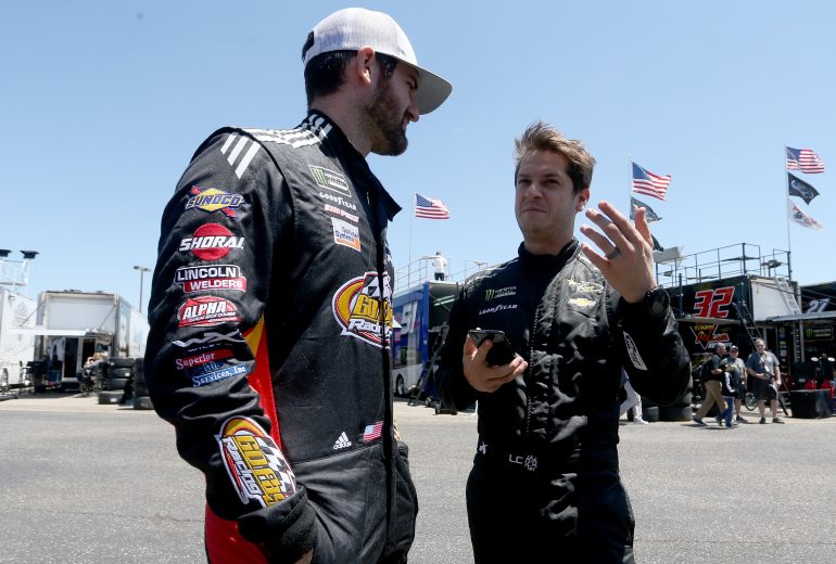TALLADEGA, AL - APRIL 26: Corey LaJoie, driver of the #32 Schuler Systems Ford,, talks with Landon Cassill, driver of the #00 Home Town Lenders Chevrolet, during practice for the Monster Energy NASCAR Cup Series GEICO 500 at Talladega Superspeedway on April 26, 2019 in Talladega, Alabama. (Photo by Brian Lawdermilk/Getty Images) | Getty Images