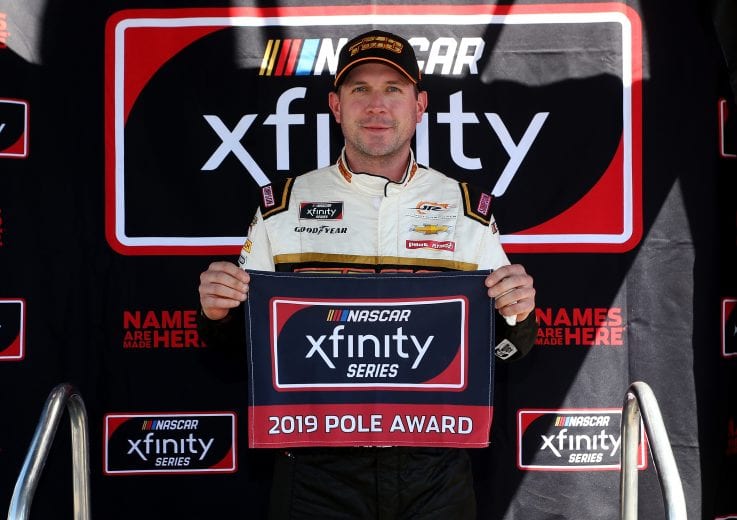 TALLADEGA, AL - APRIL 27: Michael Annett, driver of the #1 TMC Transportation Chevrolet, poses with the pole award during qualifying for the NASCAR Xfinity Series MoneyLion 300 at Talladega Superspeedway on April 27, 2019 in Talladega, Alabama. (Photo by Brian Lawdermilk/Getty Images) | Getty Images