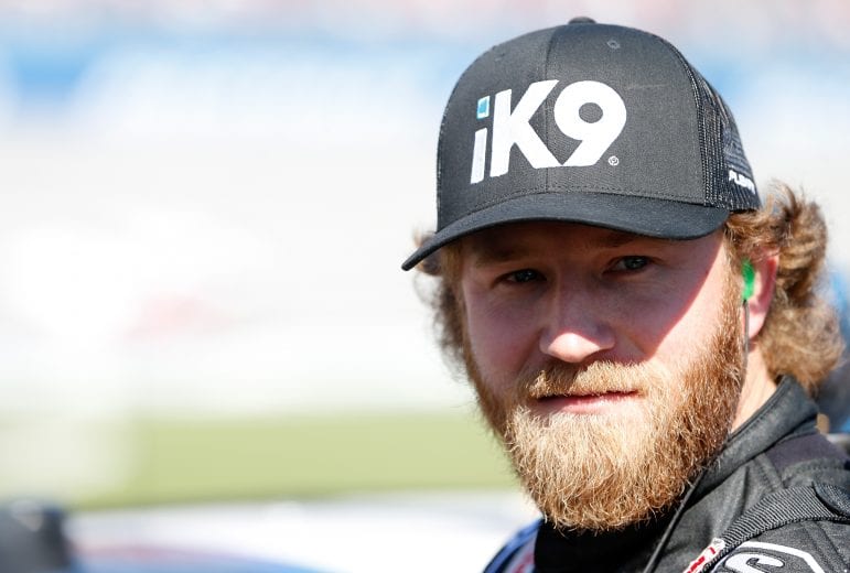 TALLADEGA, AL - APRIL 27: Jeffrey Earnhardt, driver of the #18 iK9 Toyota, stands during qualifying for the NASCAR Xfinity Series MoneyLion 300 at Talladega Superspeedway on April 27, 2019 in Talladega, Alabama. (Photo by Brian Lawdermilk/Getty Images) | Getty Images
