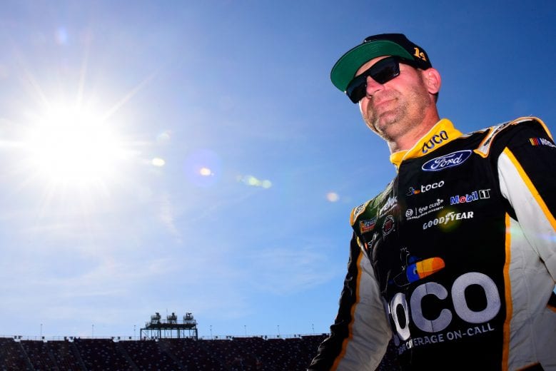TALLADEGA, AL - APRIL 27:  Clint Bowyer, driver of the #14 Toco Warranty Ford, walks on the grid during qualifying for the Monster Energy NASCAR Cup Series GEICO 500 at Talladega Superspeedway on April 27, 2019 in Talladega, Alabama.  (Photo by Jared C. Tilton/Getty Images) | Getty Images