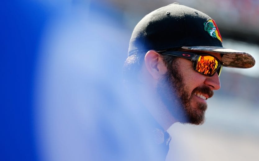 TALLADEGA, AL - APRIL 27:  Martin Truex Jr., driver of the #19 Bass Pro Shops Toyota, stands on the grid during qualifying for the Monster Energy NASCAR Cup Series GEICO 500 at Talladega Superspeedway on April 27, 2019 in Talladega, Alabama.  (Photo by Brian Lawdermilk/Getty Images) | Getty Images