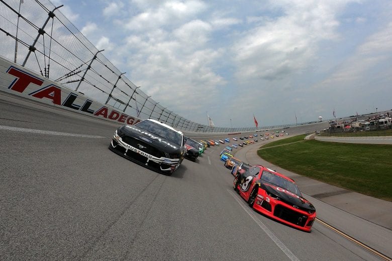 TALLADEGA, AL - APRIL 28: Austin Dillon, driver of the #3 Dow Chevrolet, and Aric Almirola, driver of the #10 Smithfield Ford, lead the field prior to the start of the Monster Energy NASCAR Cup Series GEICO 500 at Talladega Superspeedway on April 28, 2019 in Talladega, Alabama. (Photo by Jared C. Tilton/Getty Images) | Getty Images