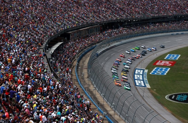 TALLADEGA, AL - APRIL 28: Joey Logano, driver of the #22 MoneyLion Ford, and Daniel Suarez, driver of the #41 Coca-Cola Orange Vanilla Ford, lead the field during the Monster Energy NASCAR Cup Series GEICO 500 at Talladega Superspeedway on April 28, 2019 in Talladega, Alabama. (Photo by Sean Gardner/Getty Images) | Getty Images