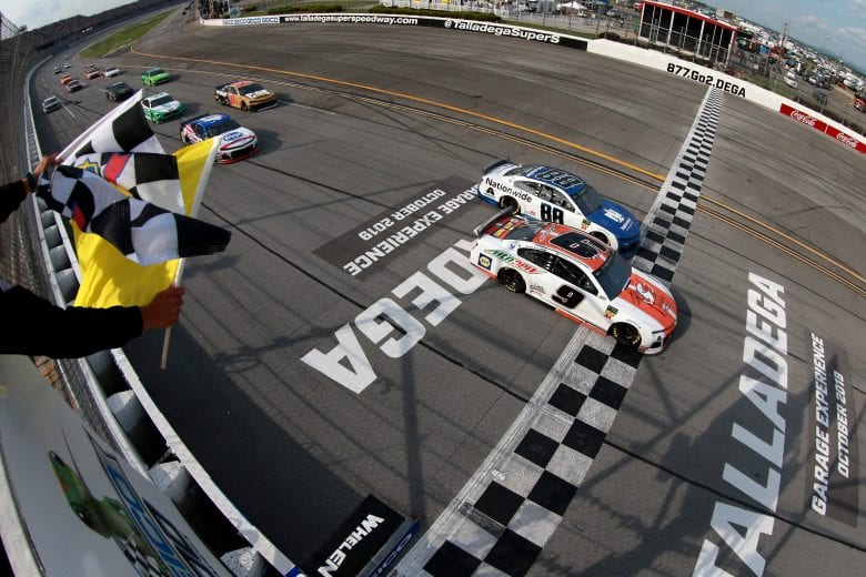 TALLADEGA, AL - APRIL 28: Chase Elliott, driver of the #9 Mountain Dew/Little Caesar's Chevrolet, takes the checkered flag to win the Monster Energy NASCAR Cup Series GEICO 500 at Talladega Superspeedway on April 28, 2019 in Talladega, Alabama. (Photo by Sean Gardner/Getty Images) | Getty Images